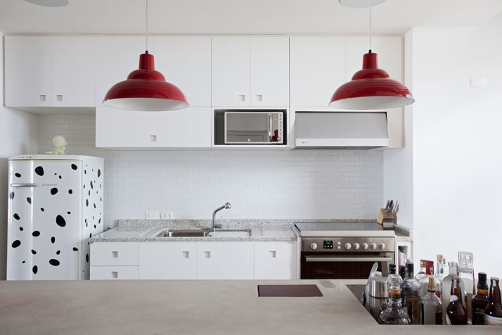 Modern Chefs Kitchen Interior With Red Accents