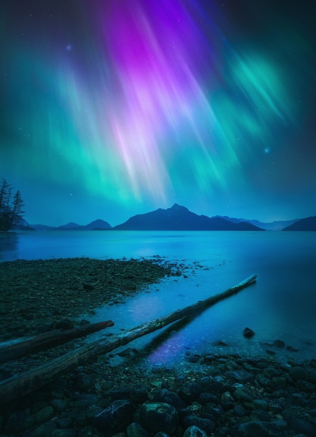 Northern Lights Landscape Over Mountain Lake