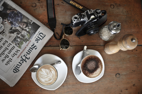 Vintage Camera And Coffee Tabletop Still Life