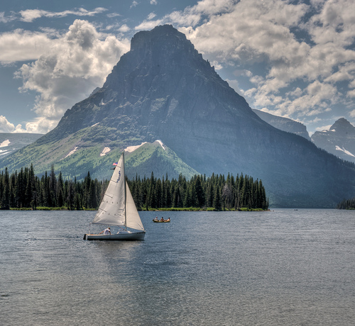 Sailboat On Tranquil Mountain Lake Landscape