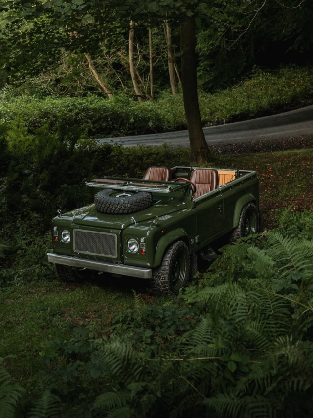 Vintage Green Land Rover Forest Landscape