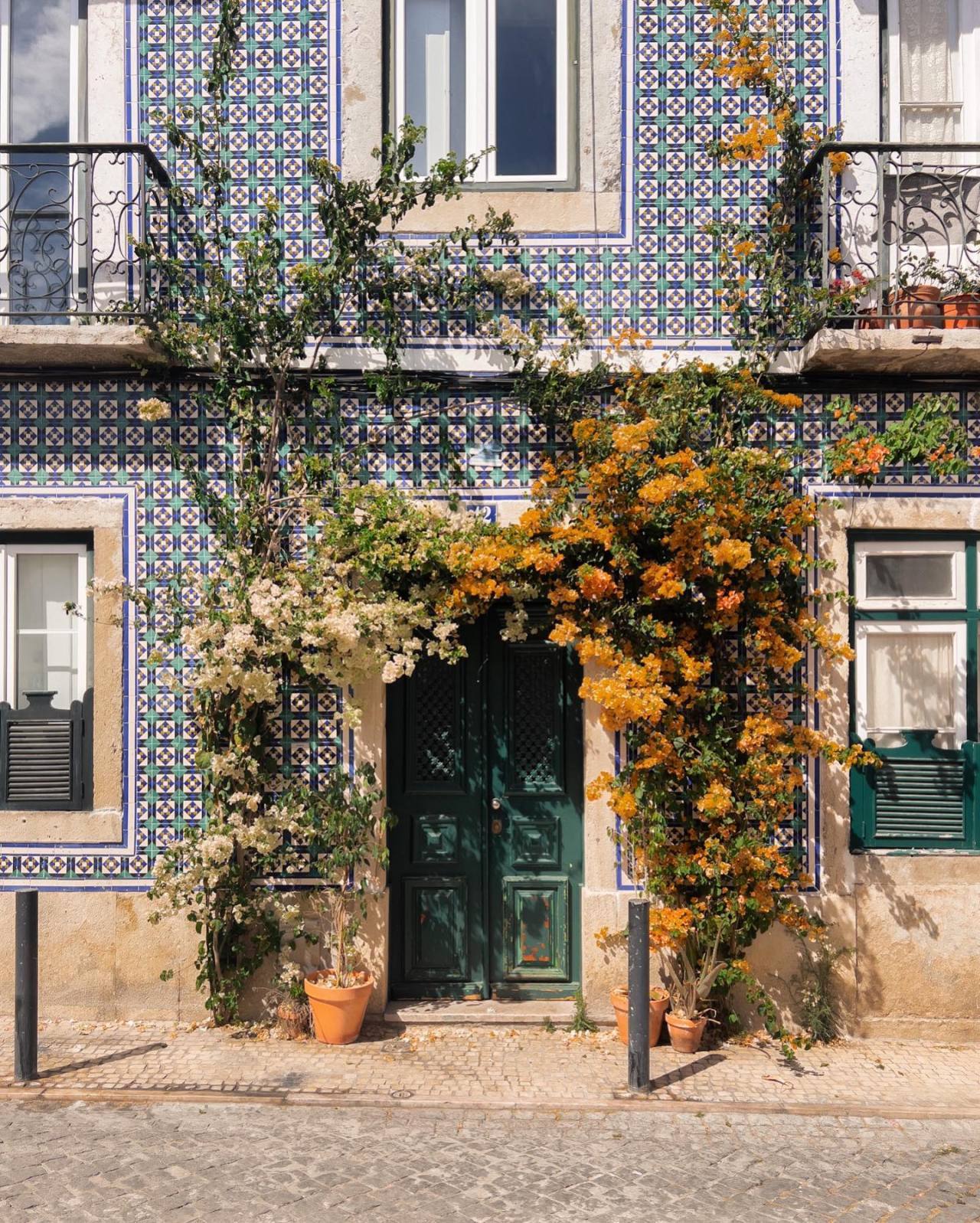 Cobblestone Patio With Azulejo Tiles Landscape