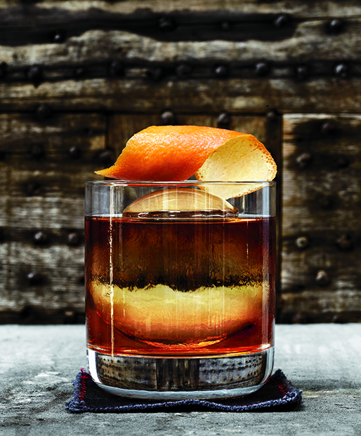 Old-fashioned Cocktails On Rustic Wooden Bar
