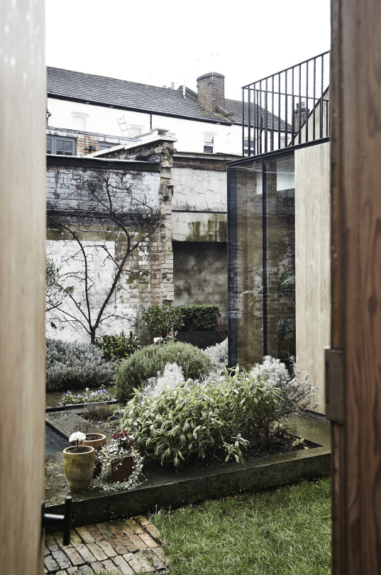 Lush Courtyard Garden In Historic City Landscape