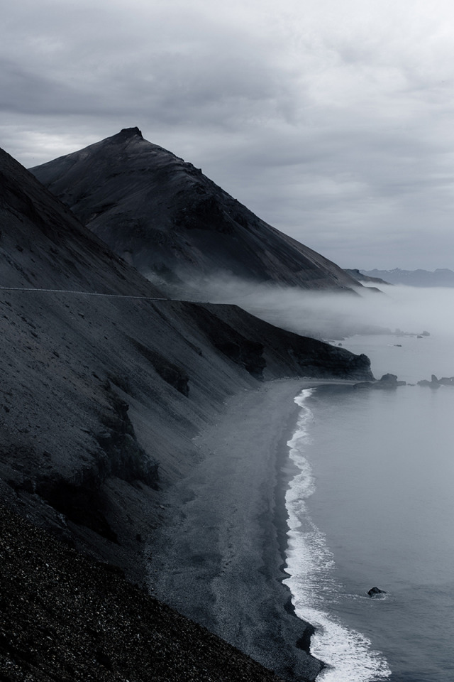 Black Rocky Mountain Coastline Cloudy Skyline