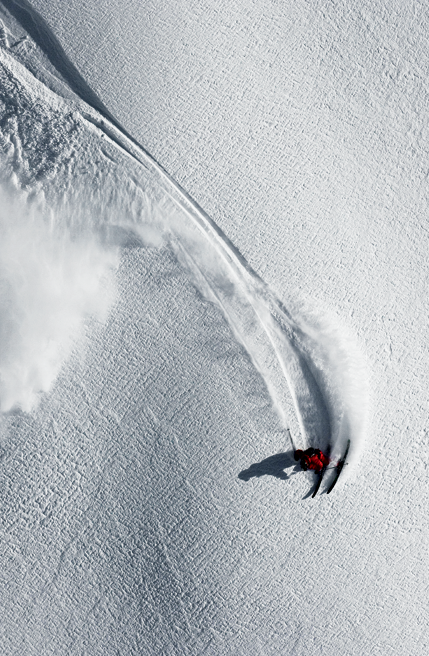 Snowboarder Descending Powdery Slopes Landscape