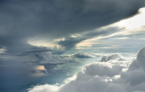 Aerial View Of Cloudy Skies From Airplane