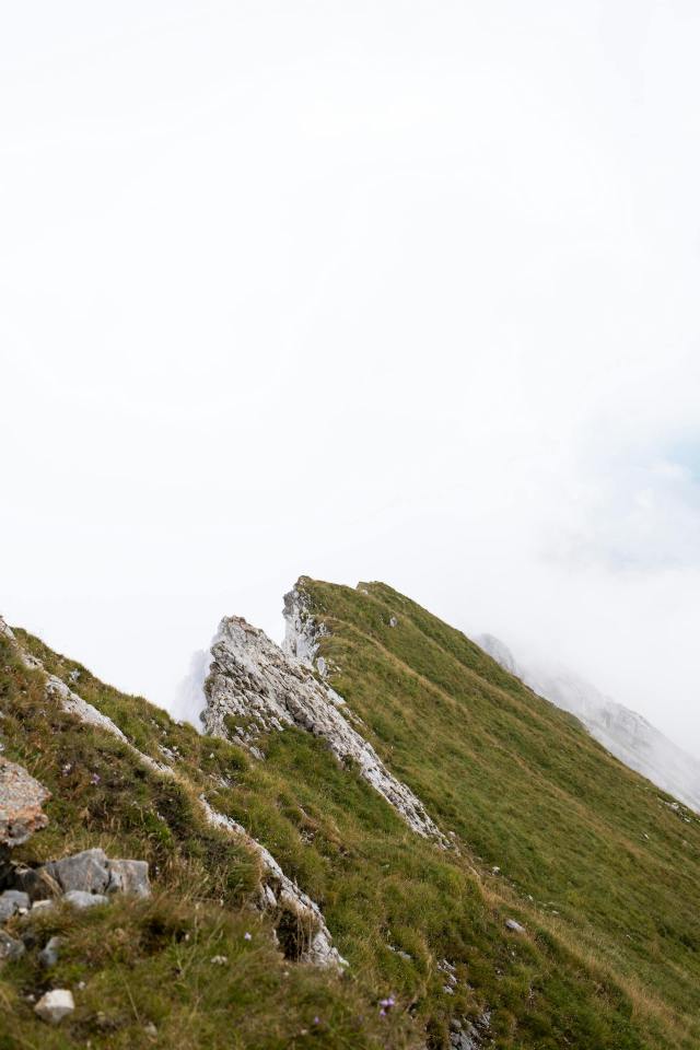 Grassy Mountain Peaks Cloudy Sky Landscape