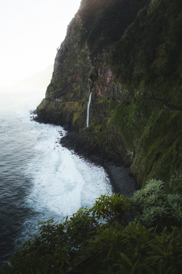 Moss Covered Cliff Waterfall Ocean Waves