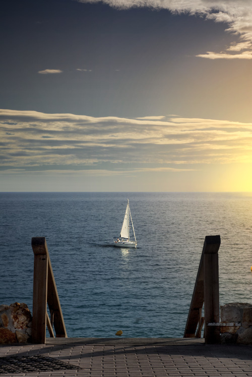 Serene Ocean Sailboat Landscape Photography