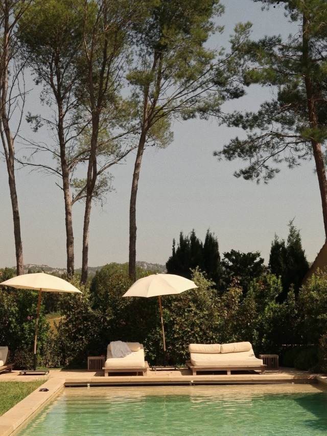 Pine Trees Pool Lounge Chairs Umbrellas