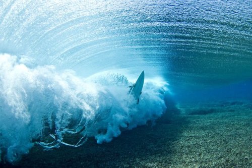 Surfer Riding Churning Ocean Waves