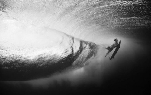 Surfer Riding Massive Wave Aerial View