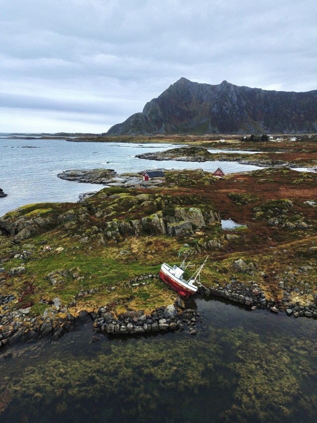 Rocky Coastline Seascape Boat Moss Covered Rocks