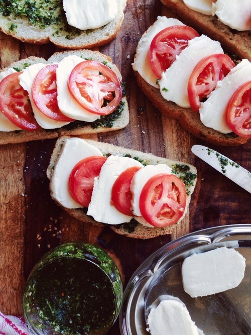 Caprese Sandwiches On Rustic Wooden Board