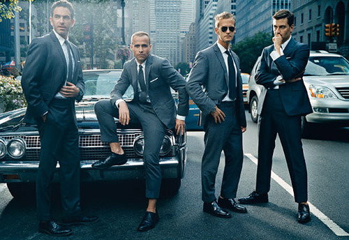 Suited Enforcers Patrolling Urban Streets