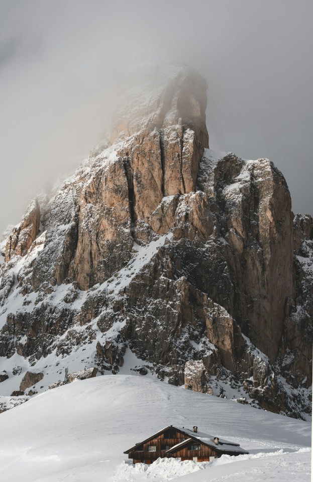 Snow Covered Mountain Peak Foggy Landscape Rustic Cabin