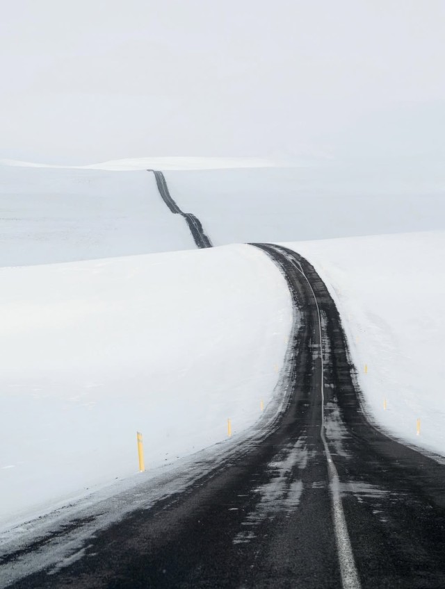 Snow Covered Road Winding Landscape