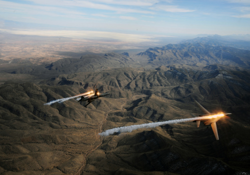 Aerial Fighter Jets Over Mountain Ridges