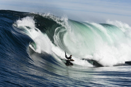 Surfer Riding Massive Wave Ocean Seascape
