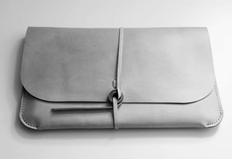 Gray Leather Clutch Flat Lay Lifestyle Photo