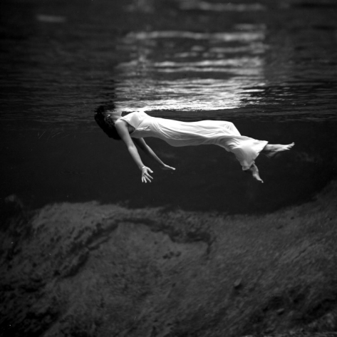 Ghostly Figure Floating River Landscape