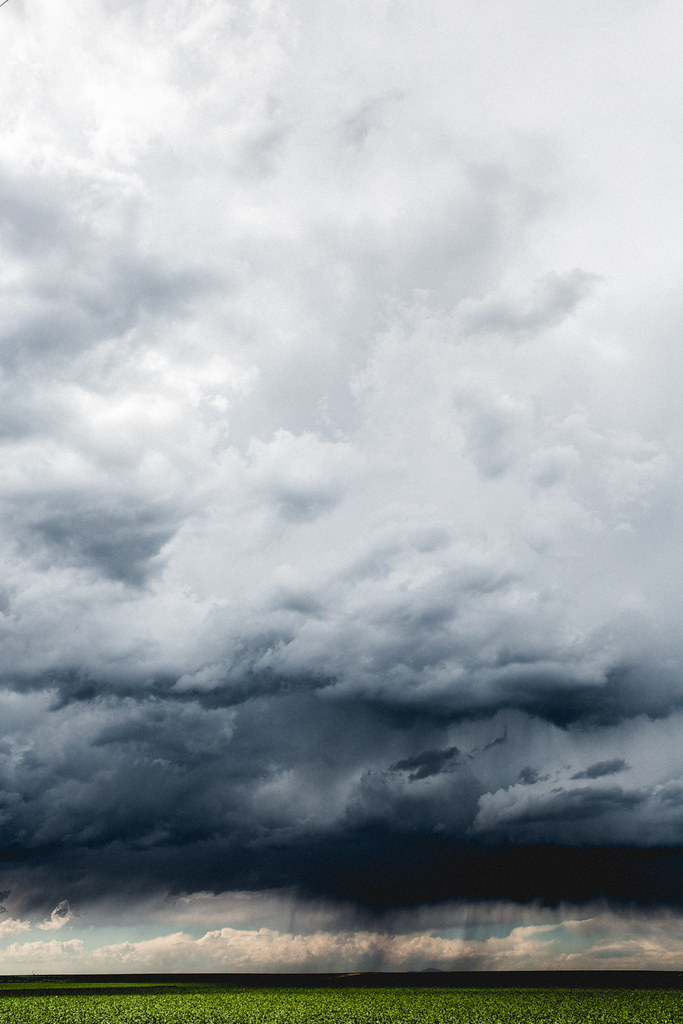 Dramatic Storm Clouds Over Rural Farmscape
