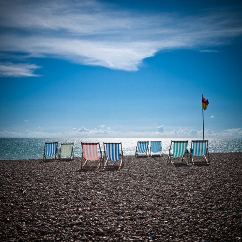 Colorful Beach Chairs Coastal Landscape