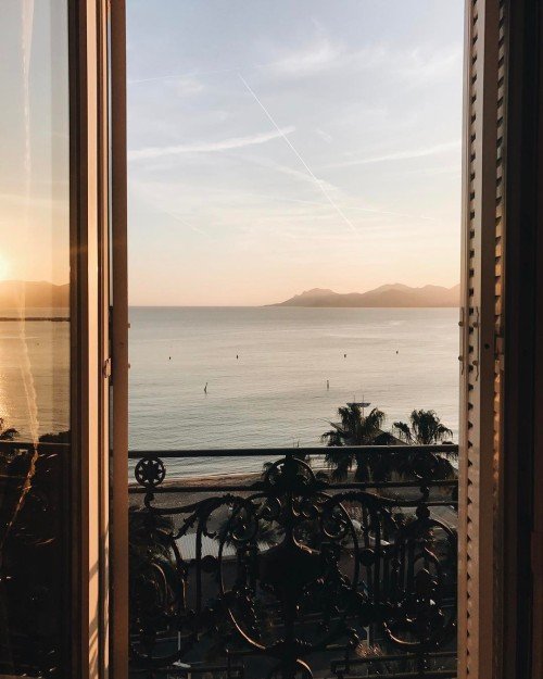 Open Window Ocean View Sunset Iron Balcony Railing