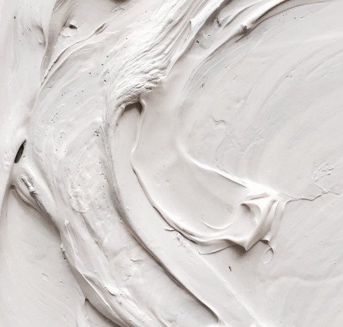 White Cream Swirl Texture Close Up Frosting Pattern