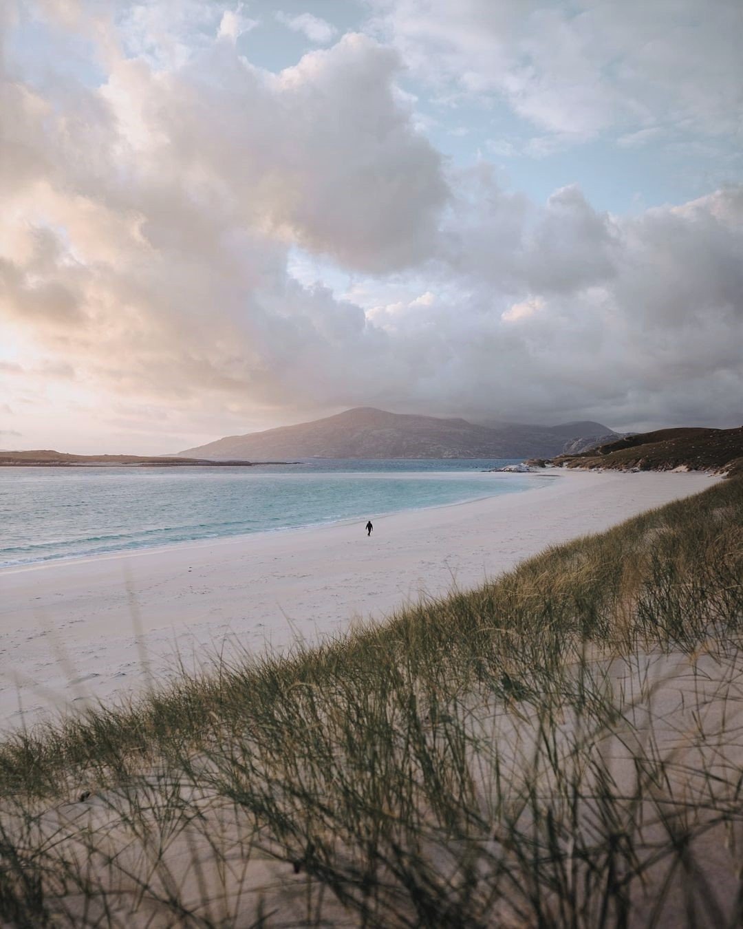 White Sand Beach Turquoise Water Mountain Coast Person Walking
