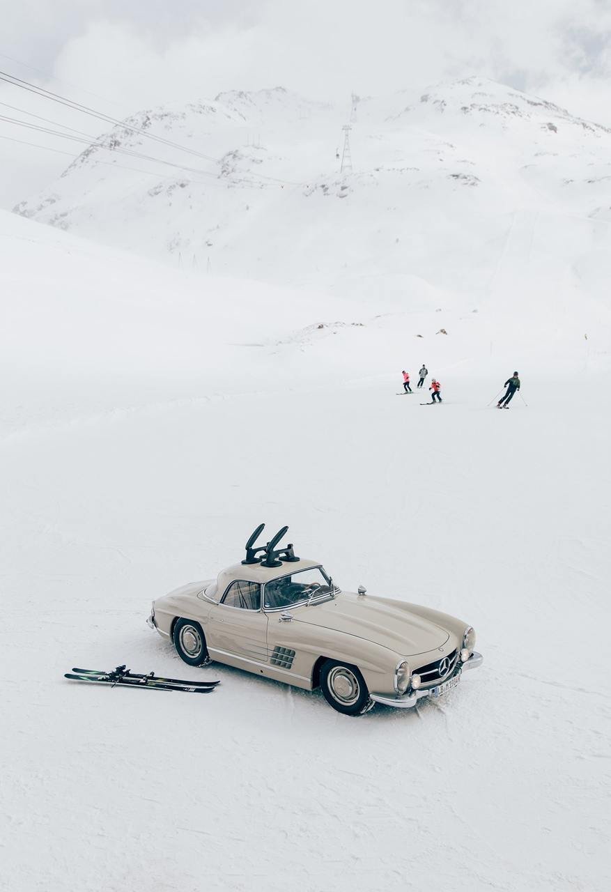 Classic Mercedes Gullwing Car With Skis On Snow Mountain Slope