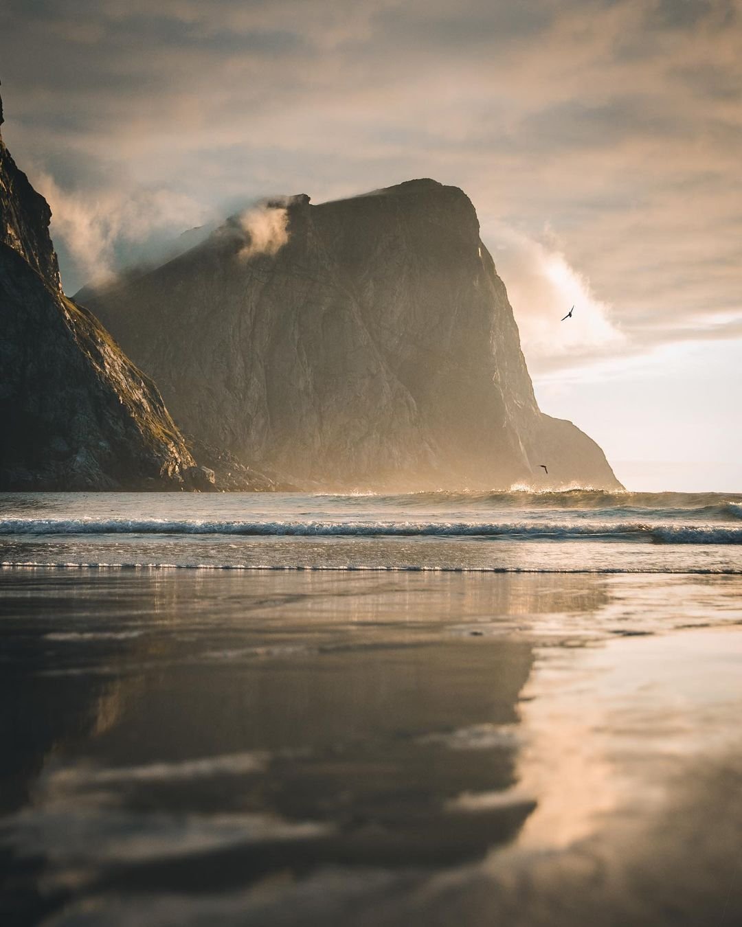 Dramatic Coastal Cliff Ocean Waves Sandy Beach Sunset