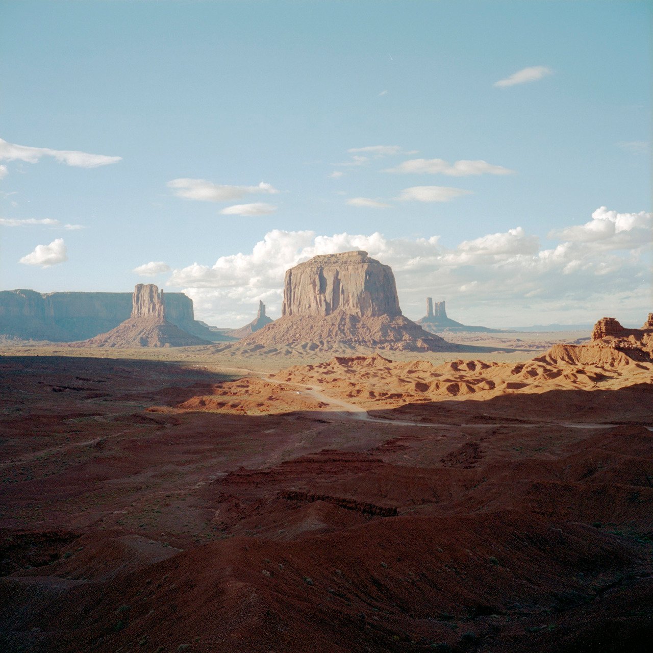 Monument Valley Desert Landscape Red Sandstone Buttes Blue Sky