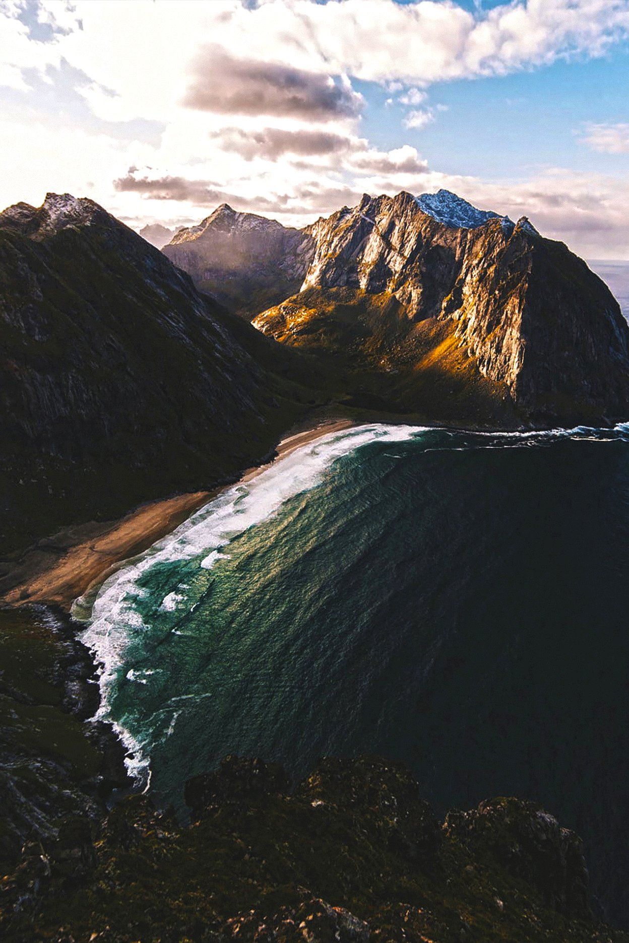 Aerial View Ocean Waves Breaking Rocky Mountain Coastline Beach