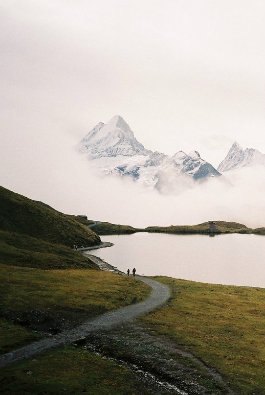 Snow Capped Mountain Peak Alpine Lake Green Meadow Trail Hikers