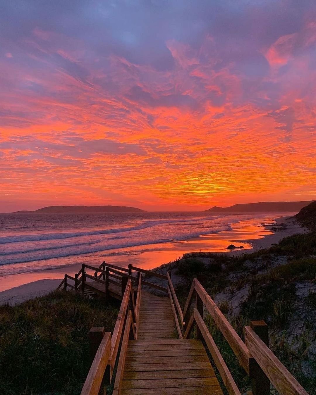 Wooden Boardwalk Stairs Orange Sunset Beach Ocean Waves