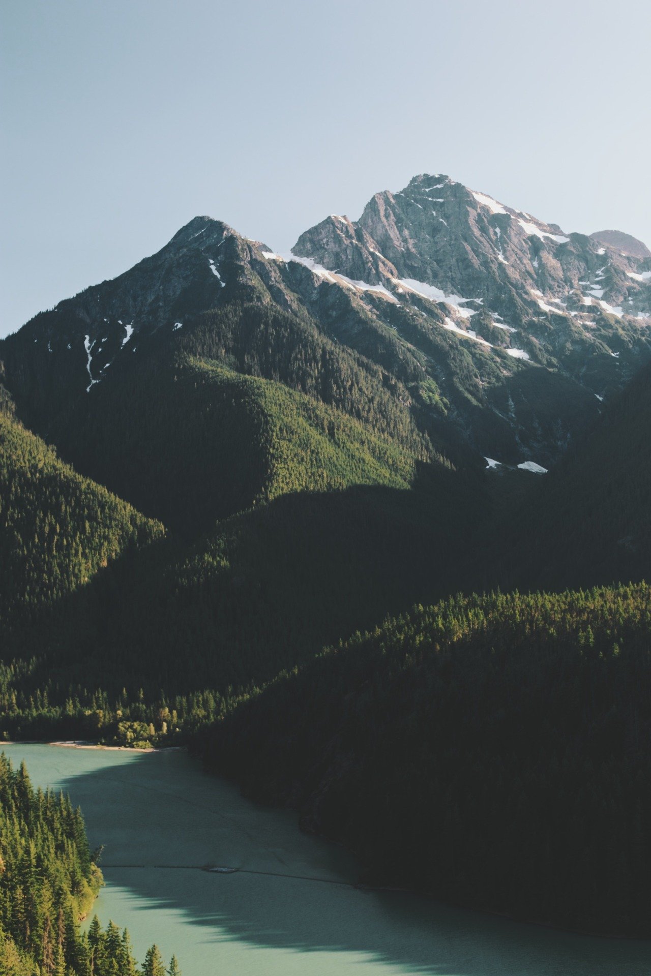 Snow Capped Mountain Peaks Turquoise Lake Evergreen Forest