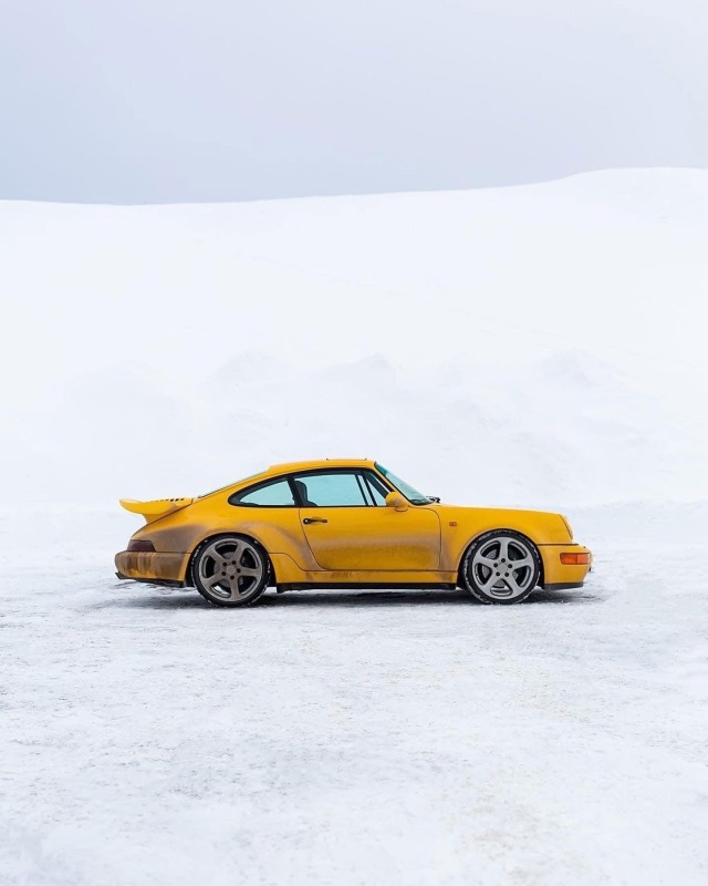 Yellow Porsche 911 Sports Car Snow Landscape